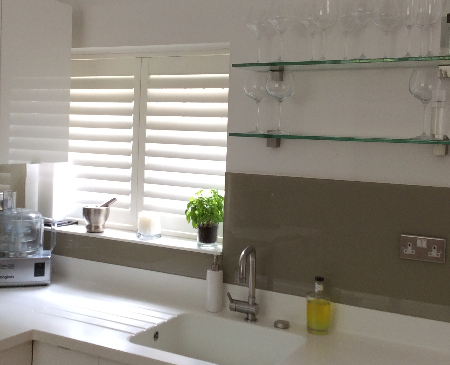 Low cost kitchen shutters give a stylish finish at a great price.